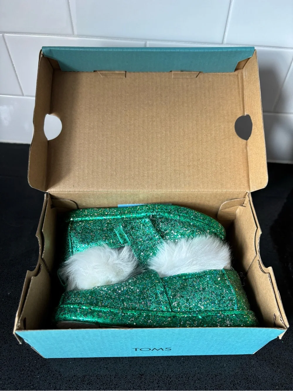 Toms Kids Green Glitter Slip-On Moccasins with White Pom
